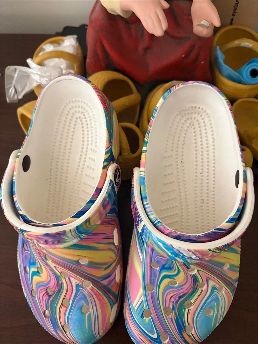 CROCS Kids Marble Pattern Slip-On Clogs in Pink Blue Yellow
